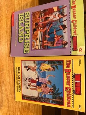 Scholastic purple and yellow children's book backs